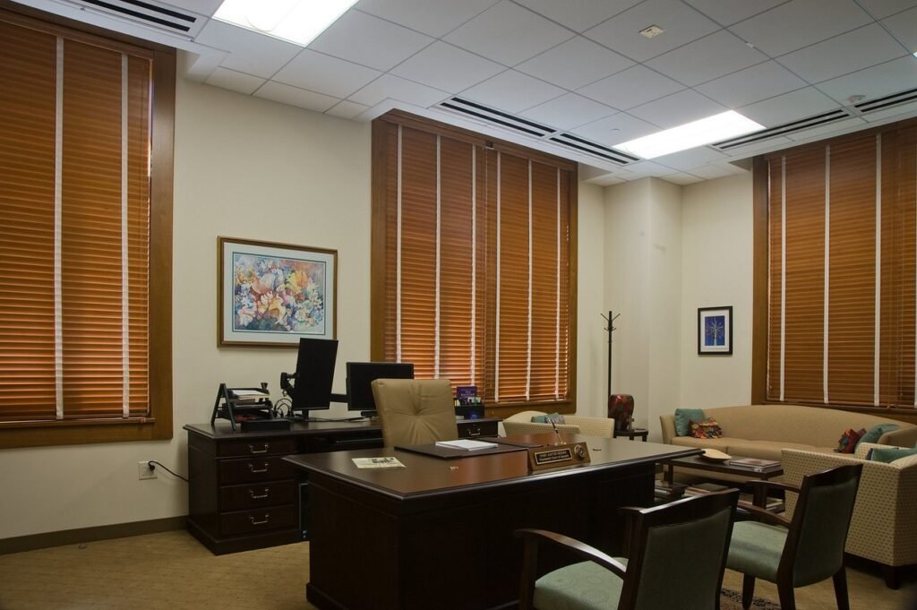 wood blinds installed in an executive office in a historic building
