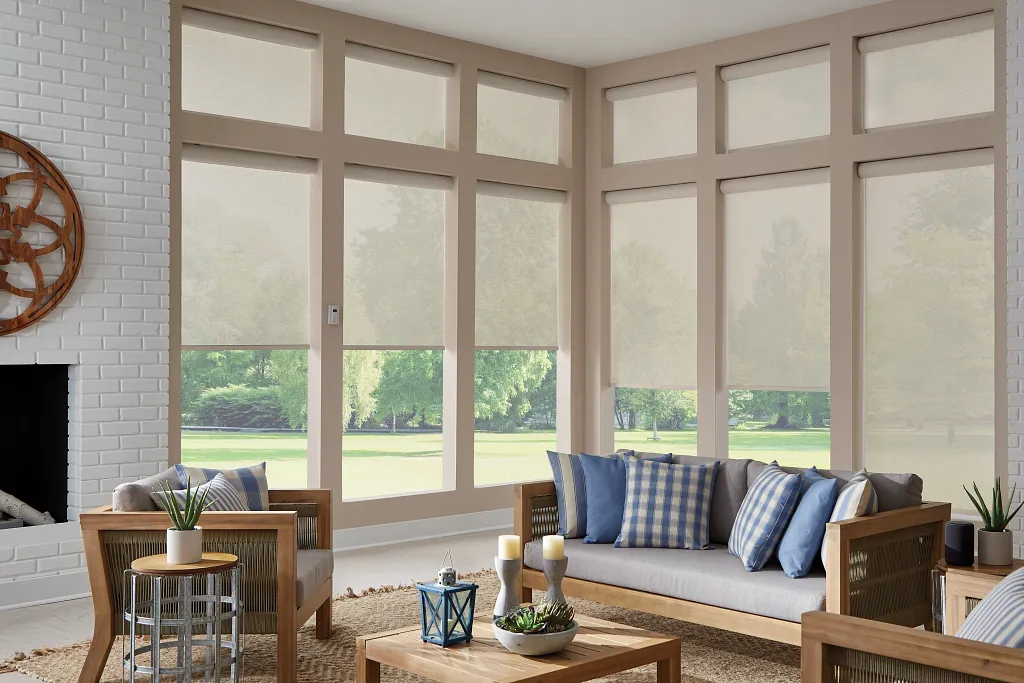 Motorized roller shades installed in a Monticello great room
